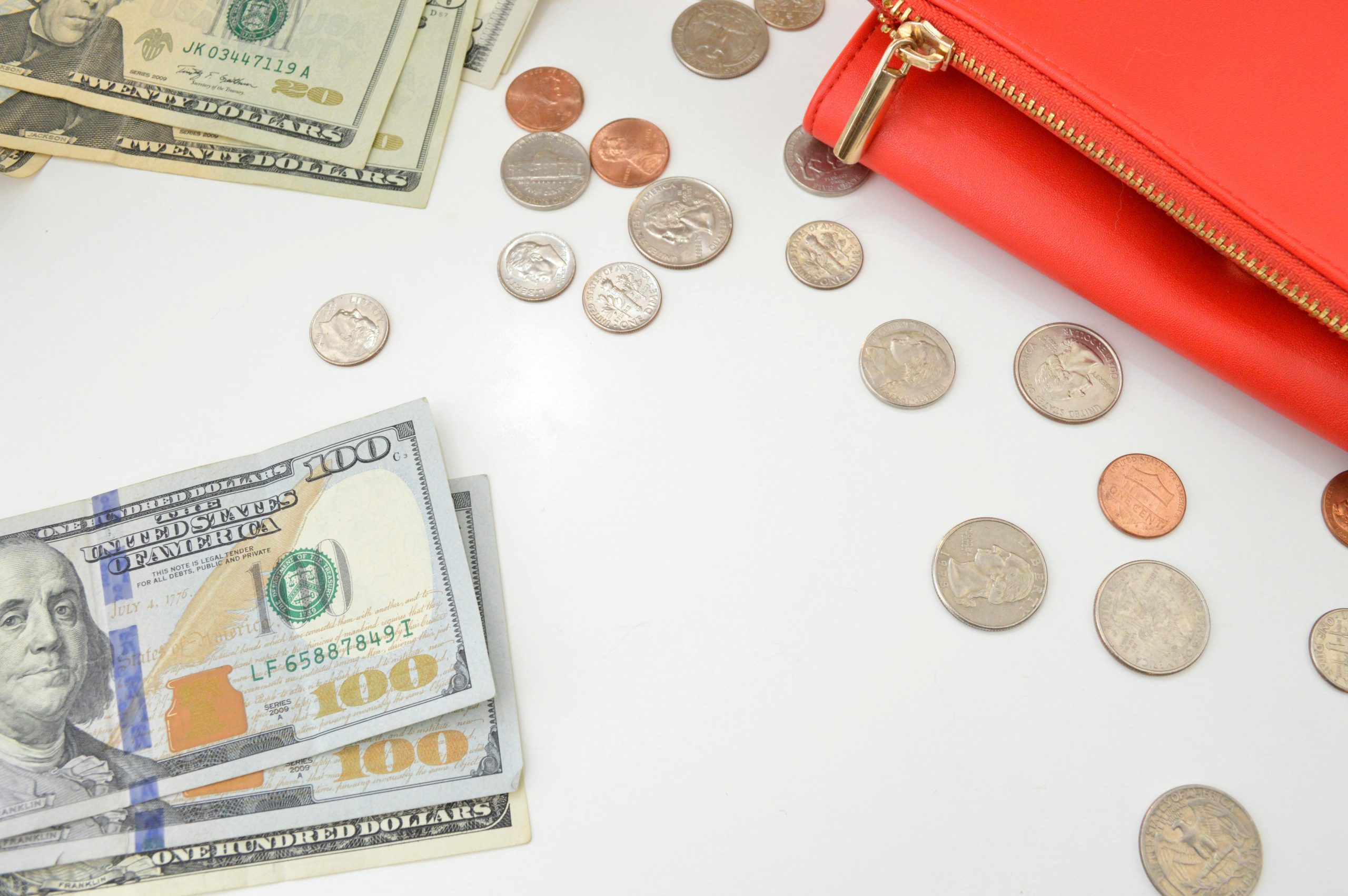 coins spilling out of a purse representing the value of a business